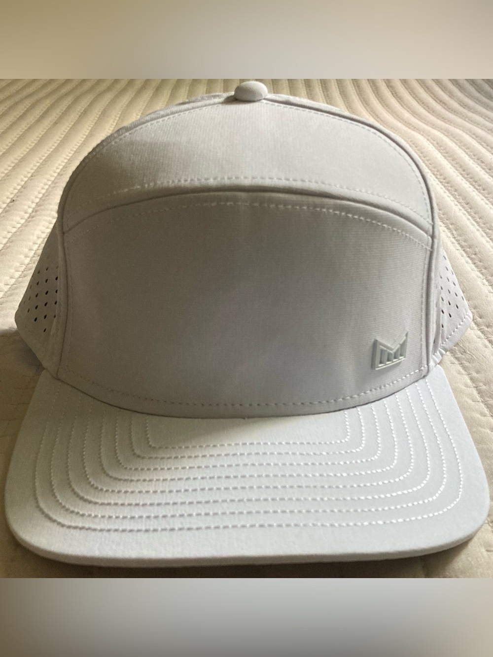 Melin Trenches HYDRO Performance SnapBack Hat Cap Golf White Breathable Comfort